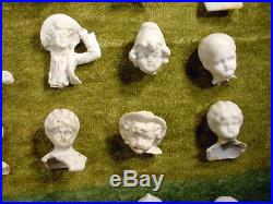 66 x excavated bisque doll heads Hertwig age 1900 Germany mixed media alterd art