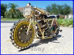 Handmade Motorcycle made with watch parts and other materials. One of a kind